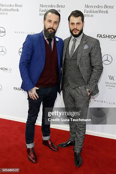 Tobias Bojko and Manuel Cortez attend the Marc Cain show during the Mercedes-Benz Fashion Week Berlin Autumn/Winter 2016 at Brandenburg Gate on...