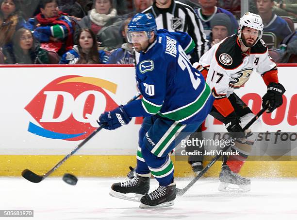 Ryan Kesler of the Anaheim Ducks and Chris Higgins of the Vancouver Canucks watch a loose puck during their NHL game at Rogers Arena January 1, 2016...