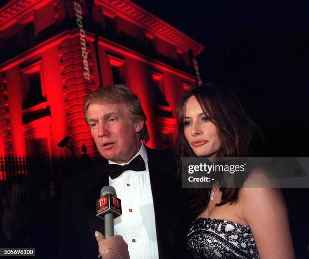 Billionaire Donald Trump and Slovenian model Melania Knauss arrive at the Bloomberg Party, held at the Trade Ministry of The Russian Foundation in...