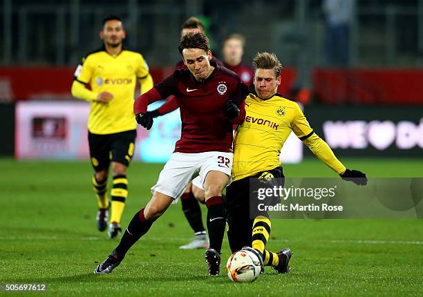 Lukas Piszczek of Dortmund and of Josef Sural Prague battle for the ball during the friendly match between Borussia Dortmund and Sparta Prague at at...
