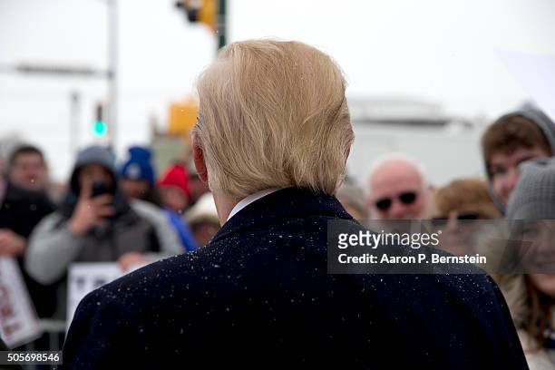 Republican presidential candidate Donald Trump greets supporters outside the John Wayne Birthplace Museum on January 19, 2016 in Winterset, Iowa....