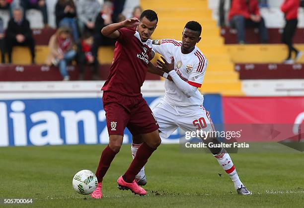 Oriental Lisboa's forward Fernando dos Santos with SL Benfica's defender Nelson Semedo in action during the Taca da Liga match between Oriental...