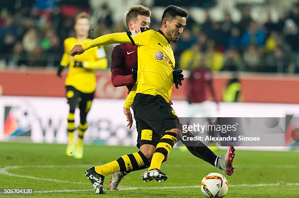 Josef Sural of Sparta Prague challenges Ilkay Guendogan of Borussia Dortmund during the friendly match between Borussia Dortmund v Sparta Prague on...