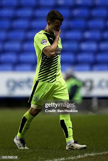 Jonathan Hogg of Huddersfield walks off the pitch after been sent off during The Emirates FA Cup Second Round match between Reading and Huddersfield...