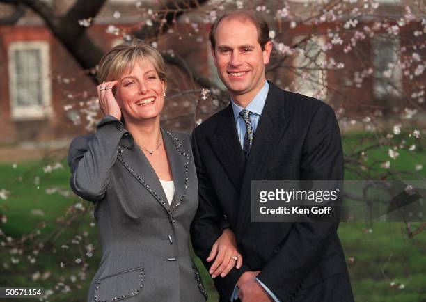 Sophie Rhys-Jones and Britain's Prince Edward smile for photographers on grounds of St. James's Palace during announcement of their engagement.
