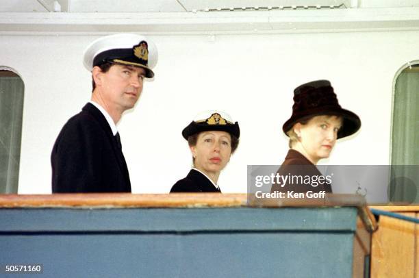 Britain's Princess Anne in the uniform of Rear Admiral, boarding Royal Yacht Britannia w. Husband Captain Timothy Laurence and Sophie Rhys-Jones to...