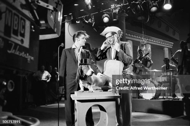 Alfred Wertheimer/MUUS Collection via Getty Images) During rehearsals, American television host Steve Allen introduces musician Elvis Presley and a...