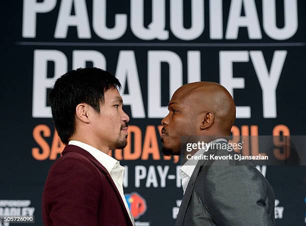 Manny Pacquiao and Timothy Bradley pose after a news conference where they announced their upcoming world welterweight championship bout at the...