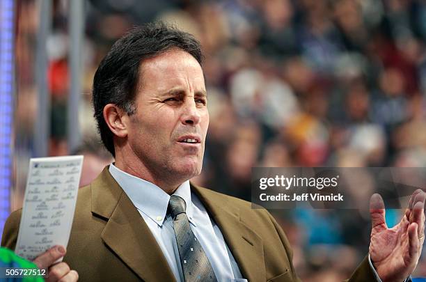 Assistant coach Doug Lidster of the Vancouver Canucks looks on from the bench during their NHL game against the Arizona Coyotes at Rogers Arena...