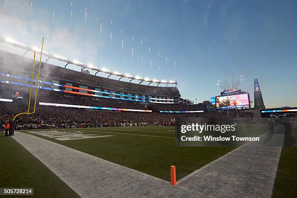 Playoffs: View of USA flag being unfurled on field during anthem before New England Patriots vs Kansas City Chiefs game at Gillette Stadium....