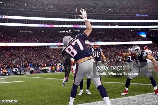 Playoffs: Rear view of New England Patriots Rob Gronkowski victorious, spiking ball after scoring touchdown during game vs Kansas City Chiefs at...