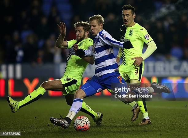 Matej Vydra of Reading beats Martin Cranie of Huddersfield to score his third and his team's fourth goal during The Emirates FA Cup Second Round...