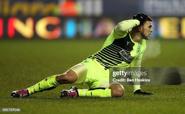 Nahki Wells of Huddersfield reacts after missing a chance during The Emirates FA Cup Second Round match between Reading and Huddersfield Town at...