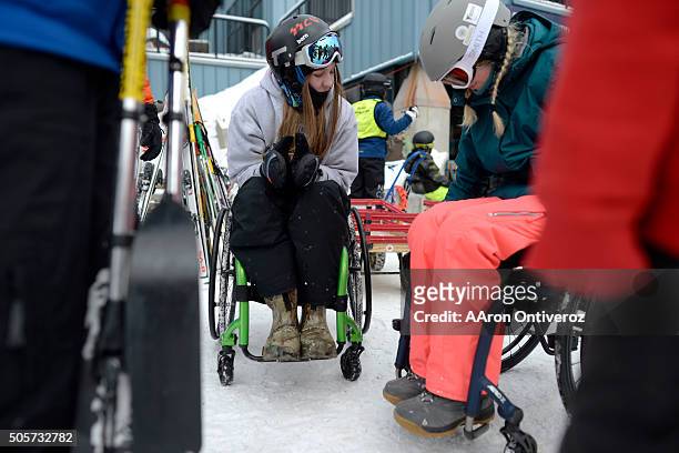 Kailyn Forsberg speaks with Georgiana Burnside during Forsberg's first day back on the snow since being paralyzed in a slopestyle skiing accident...