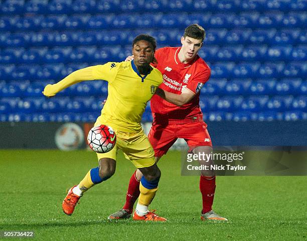Sam Hart of Liverpool and Jordan Botaka of Leeds United in action during the Liverpool v Leeds United U21 Premier League Cup game at Prenton Park on...