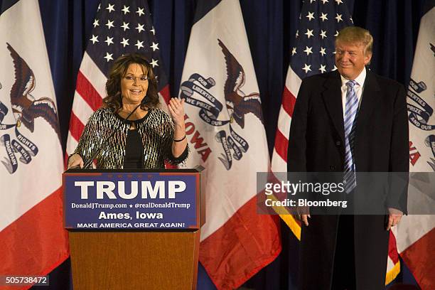 Sarah Palin, former governor of Alaska, left, speaks as Donald Trump, president and chief executive of Trump Organization Inc. And 2016 Republican...