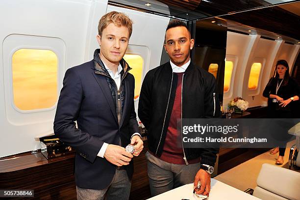 Nico Rosberg and Lewis Hamilton visit the IWC booth during the launch of the Pilot's Watches Novelties from the Swiss luxury watch manufacturer IWC...