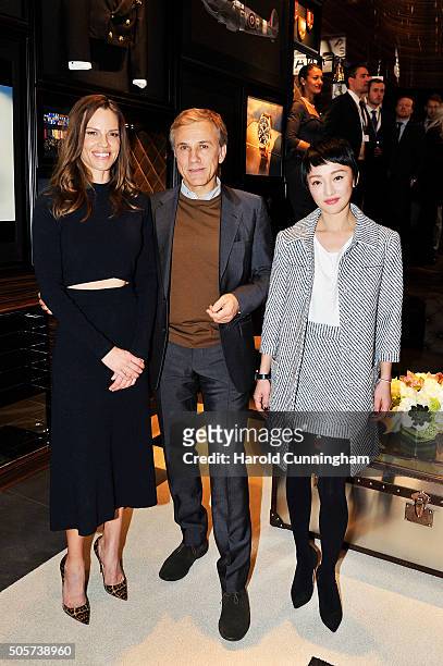 Hilary Swank, Christoph Waltz and Zhou Xun visit the IWC booth during the launch of the Pilot's Watches Novelties from the Swiss luxury watch...