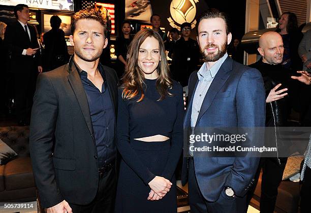 Scott Eastwood, Hilary Swank and Chris Evans visit the IWC booth during the launch of the Pilot's Watches Novelties from the Swiss luxury watch...