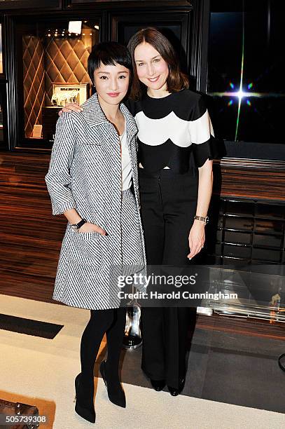 Zhou Xun and Elsa Zylberstein visit the IWC booth during the launch of the Pilot's Watches Novelties from the Swiss luxury watch manufacturer IWC...