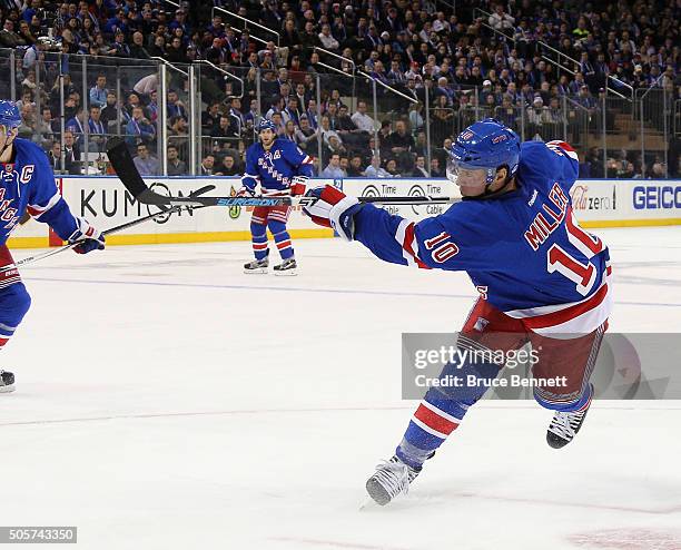 Miller of the New York Rangers takes the shot against the Vancouver Canucks at Madison Square Garden on January 19, 2016 in New York City. The...