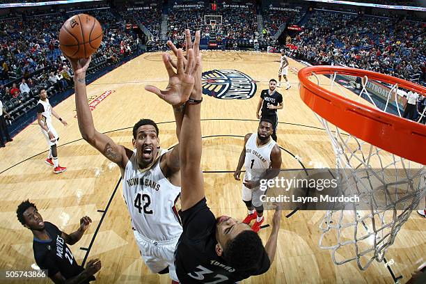 Alexis Ajinca of the New Orleans Pelicans shoots the ball against the Minnesota Timberwolves on January 19, 2016 at Smoothie King Center in New...