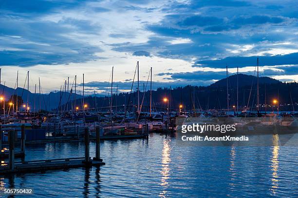 downtown kelowna harbour at dusk - kelowna stock pictures, royalty-free photos & images