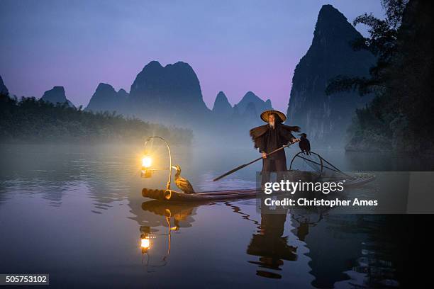 river lee cormorant fisherman - tribal head gear in china stock pictures, royalty-free photos & images