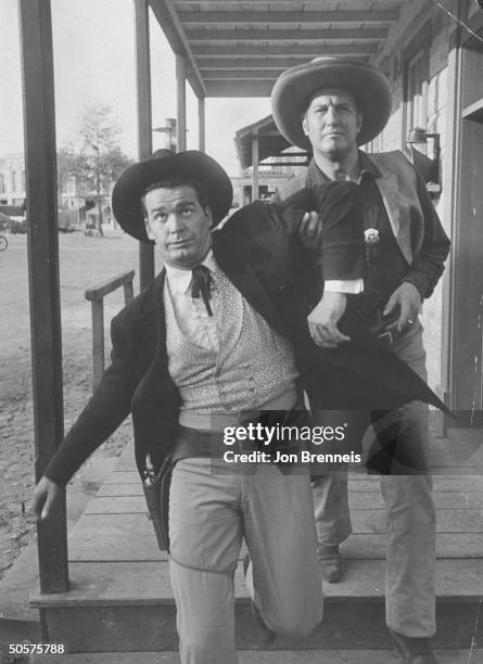 Actors Ben Gage and James Garner on the set of Maverick a TV show parody of Gunsmoke.