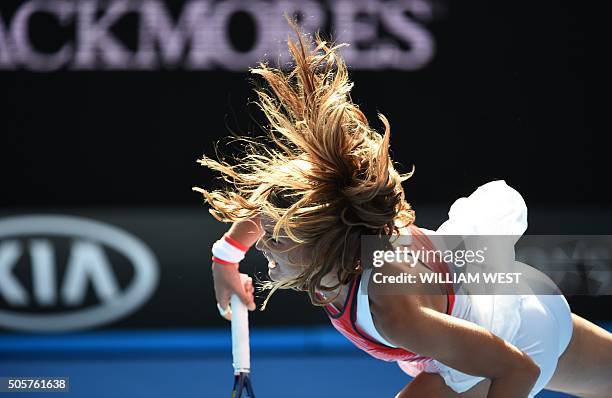 Greece's Maria Sakkari serves during her women's singles match against Spain's Carla Suarez Navarro on day three of the 2016 Australian Open tennis...