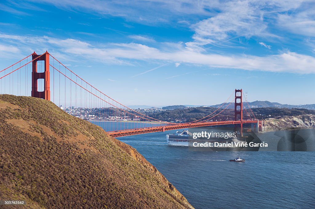 Ship sailing under Golden Gate Bridge