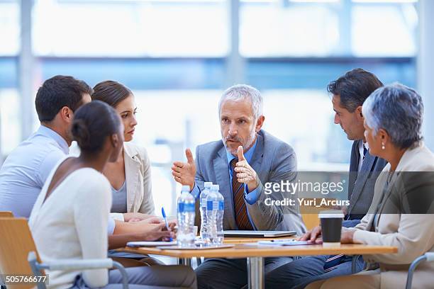 serious strategising - leadership stock pictures, royalty-free photos & images