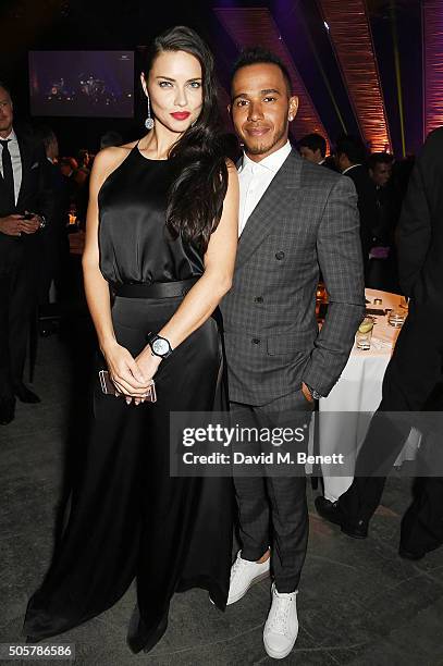 Adriana Lima and Lewis Hamilton attend the IWC "Come Fly with us" Gala Dinner during the launch of the Pilot's Watches Novelties from the Swiss...