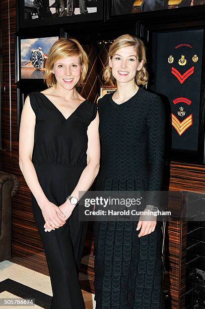 Franziska Weisz and Rosamund Pike visit the IWC booth during the launch of the Pilot's Watches Novelties from the Swiss luxury watch manufacturer IWC...