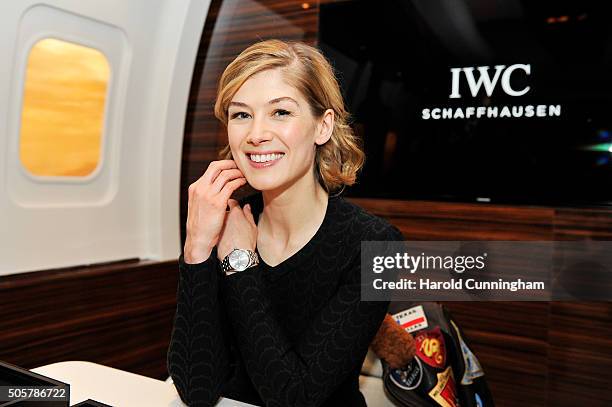 Rosamund Pike visits the IWC booth during the launch of the Pilot's Watches Novelties from the Swiss luxury watch manufacturer IWC Schaffhausen at...