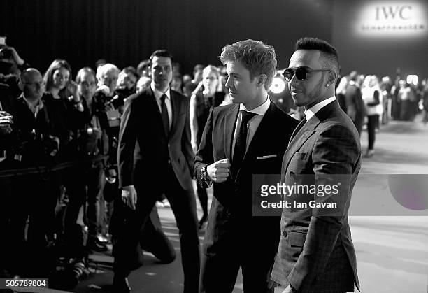 Nico Rosberg and Lewis Hamilton attend the IWC "Come Fly With Us" Gala Dinner during the launch of the Pilot's Watches Novelties from the Swiss...