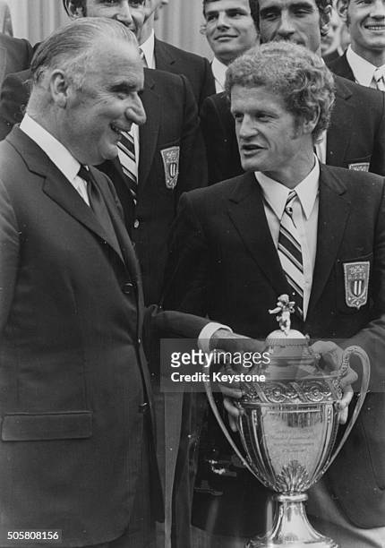 President Georges Pompidou of France presenting the French Football Cup to player Robert Herbin and his team, AS Saint Etienne, at the Elysee in...