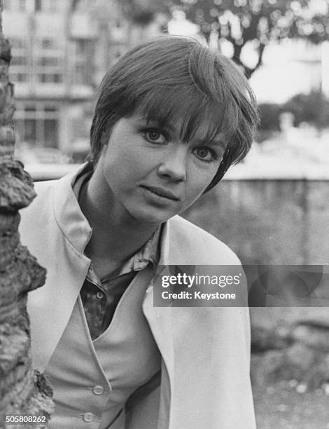 Portrait of French actress Haydee Politoff wearing a cape on the outdoor set of the film 'The Years of Youth', circa 1969.