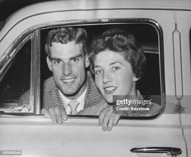 Portrait of tennis player Tony Pickard and his fiance Janet Sisson through the window their car, pictured following his withdrawl from the British...