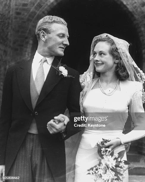 Comic actor Leslie Phillips and his bride Penelope Bartley pictured looking in to each others eyes outside All Soul's Church following their wedding...