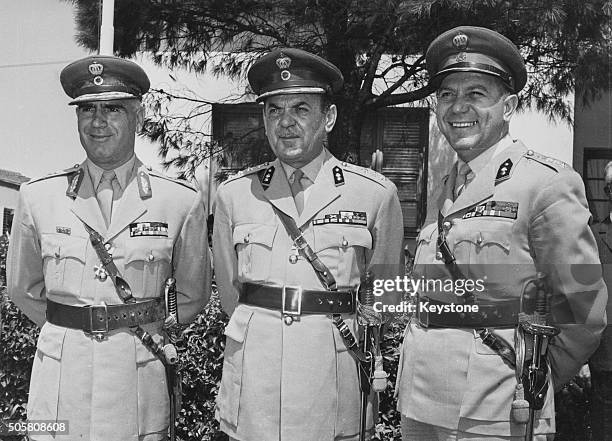 Greek Prime Minister Georgios Papadopoulos with his deputies, Brigadier Stylianos Pattakos and Colonel Nicholas Makarezos pictured together in...