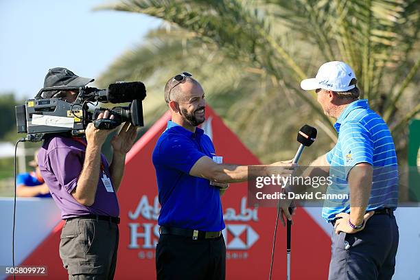 Ernie Els of South Africa is interviewed on course for Sky Sports by former European Tour winner and Ryder Cup player Andrew Coltart of Scotland...