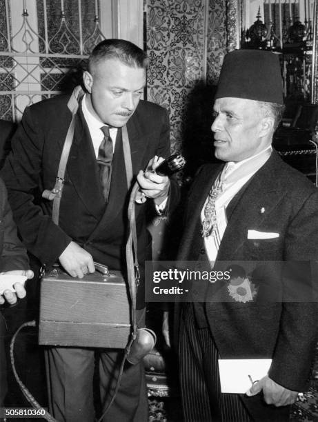 Tunisian Prime minister and New-Destour nationalist party leader Habib Ben Ali Bourguiba is interviewed 19 March 1957 in Tunis by French Agence...