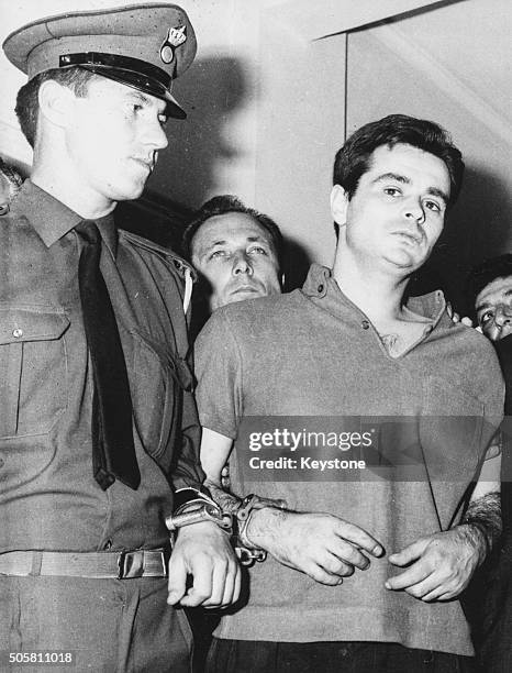 Alexandros Panagoulis being led away by an officer in military court after being sentenced to death for his assassination attempt on George...