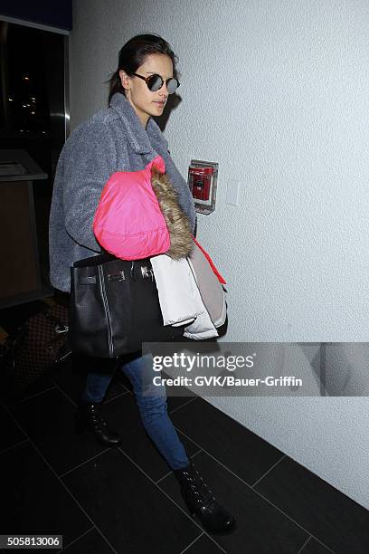 Alessandra Ambrosio is seen at LAX on January 19, 2016 in Los Angeles, California.