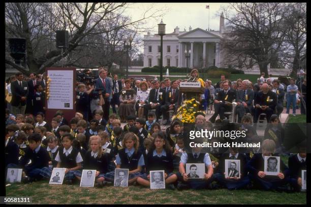 Rally marking hostage Terry Anderson's 6th yr. In Lebanon, w. Kids w. Pics of hostages in fore & in bkgrd. Peggy Say Jenco Moynihan Rather ; & Brokaw...