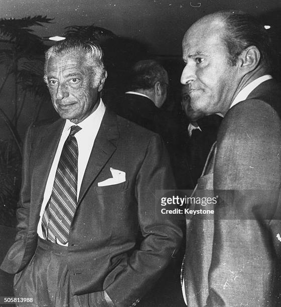 Italian businessmen Leopoldo Pirelli and Gianni Agnelli, shareholders at Fiat, pictured following the selling of Fiat shares to Libya, Rome, January...