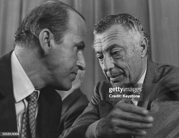 Italian businessman Leopoldo Pirelli , of Pirelli Tyres, talking to Gianni Agnelli, principal shareholder at Fiat, at the Annual Assembly of the...