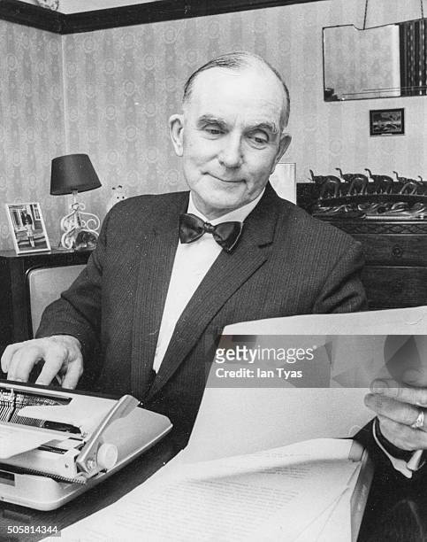 Portrait of British executioner Albert Pierrepoint writing his memoirs at a typewriter, circa 1973.