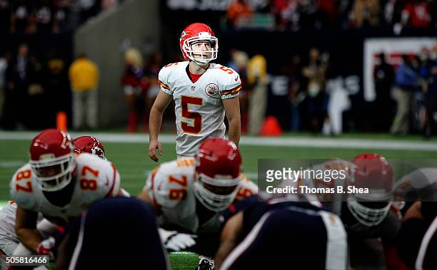 Cairo Santos of the Kansas City Chiefs looks at the field goal post before kicking a field goal agains the Houston Texans during the AFC Wild Card...